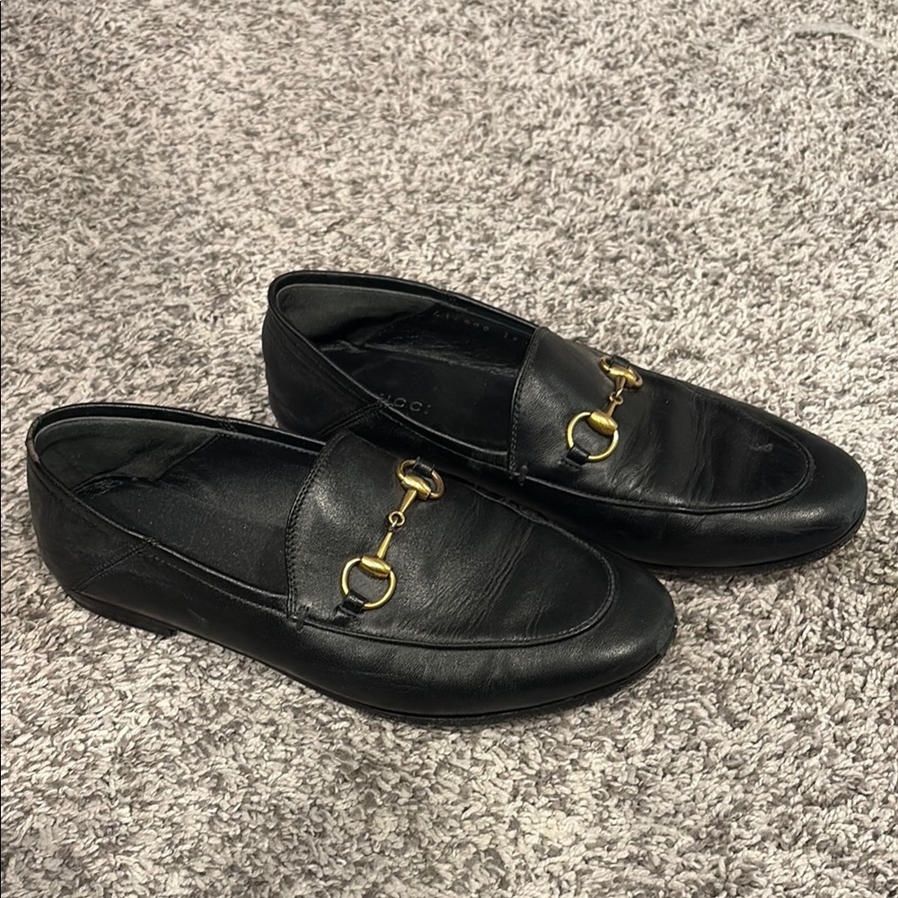 Black Leather Loafers with Gold Detailing